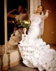 Luxe Perles Sirène Robes De Mariée 2022 Illusion À Manches Longues Sheer O-cou Volants Vague Cathédrale Train Africain À Lacets Robe De Mariée