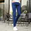 Jeans pour hommes printemps et automne 2021 mince pantalon long élastique décontracté étudiant coréen blanc mince