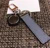 2021 Klassisk Svart / Vit / Grå PU Läder Key Chain Ring Tillbehör Modebil Keychain NE0 Club Keychains Spänne För Män Kvinnor Med Retail Box YSK09