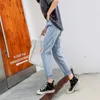 Gevşek Streetwear Sonbahar Yüksek Bel Kot Kadınlar Için Yırtık Kot Kadın Ince Harem Pantolon Düğmesi Ile Çok Cepler 10731 210527