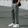 Uomo 2021 Nuovo Hip Hop Coreano Classico Jogging Pantaloni Cargo Abbigliamento di Moda di Marca Multi Tasca Pantaloni Streetwear Pantaloni M-5XL H1223