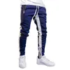Män sida Stripe Fashion Pocket Byxor Casual Streetwear Jogger Pant Hip Hop Zipper Bottom Male Pencil Byxor Utomhus Sport Byxa 210714
