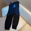 Herren-Hosen New Pants mit Panelled Muster lose Kordelzug Sport-Hosen-beiläufige Neun Punkte Jogginghose für einen Mann eine Frau