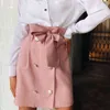 Falda de cintura alta Mujeres Otoño Verano Bolsillos elegantes Faldas sólidas Damas Casual Botón con cinturón Mini falda de una línea 210412