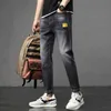 Lyxljus europeiska varor Storficka Blå Jeans Dark Department Mäns Slitage Lös Liten Rak Tube Fashion Cat Scratch Ungdom