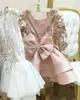 2021 Cute Pink Girls Pageant Dresses Jewel Neck Illusion Sequined Lace Appliques Long Sleeves Knee Length Short Tiered Bow Kids Flower Girl Birthday Gowns