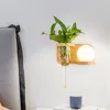 Nordic minimalistyczna wewnętrzna lampa ścienna z przełącznikiem zieloną rośliną obfitą drewno obfitymi.