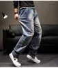 Trend Baggy Dżinsy Mężczyźni Casual Denim Patchwork Cargo Spodnie Streetwear Spodnie Plus Rozmiar Proste Kieszenie Elastyczne Waist Clohting