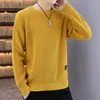 pull en cachemire jaune