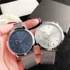 Relojes de marca para hombre y mujer, reloj de pulsera de lujo de cuarzo con banda de acero y Metal, estilo Unisex, TOM 34