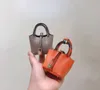 Designer sacos acessórios chaveiro mini totes crianças bolsa bolsa menina cabide chaveiro caso de luxo caso gancho fone de ouvido saco de embreagem chaves anel senhora bolsa de ombro dicky