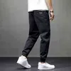 Pantaloni cargo hip-hop streetwear Pantaloni cargo da uomo imitati jeans Pantaloni Harun elastici Pantaloni da jogging Pantaloni grigi in primavera ed estate 211108