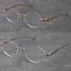 Metal Leopard Serisi Panther Rimless Güneş Gözlükleri Erkek Kadınlar Dekorasyon Tel Çerçevesi UNISEX GEWAREME OUDADA UV400 ROUND231R