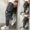 Pantaloni lunghi scozzesi da uomo Moda Primavera Autunno casual Pantaloni hip-hop da giovane uomo di alta qualità Harem elastico con lacci maschili