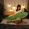 peluche di dinosauro rosa blu