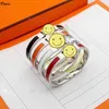 Braccialetto di lusso per gioielli Donia Classico della moda europea e americana esagerato bracciale in acciaio al titanio con lettera in metallo largo 8 mm con scatola