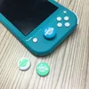 оптом лист nintend коммутатор lite джойстик крышка животных пересечение для nintendo переключатель большой палец ручка крышка крышка клюшка lite case милый