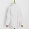 TWOTWINSTYLE Camicia bianca irregolare per le donne Risvolto manica lunga Camicetta minimalista solida Abbigliamento moda femminile Autunno 210517