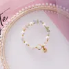 XiaoboACC – Bracelet à brins de perles pour femmes, mode coréenne, coquille irrégulière, perle de cristal, vente en gros, Fawn22