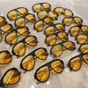 Lunettes de soleil pour femmes Monture de lunettes noires Lentille jaune Progettista Verre solaire Femme Mode Classique Plage Vacances Femmes UV 400