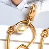 Bengelen kroonluchter ontwerpen eenvoudige gouden metaal onregelmatige oorbellen hoogwaardige parel drop oorrang mode sieraden accessoires voor vrouwen