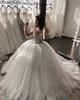 Arabisch Aso Ebi Luxuriöse Ballkleid-Hochzeitskleider in Übergröße, transparenter Ausschnitt, lange Ärmel, Perlen, abgestufter Tüll, Kapellenschleppe, Hochzeitskleid, Brautkleider, Vestido de Novia