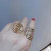 Stijl elegante strass camelia modellering ringen voor vrouwen trendy delicate hol metalen open ring celebrity sieraden cluster