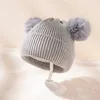 二重ふわふわボール秋と冬の豪華な暖かい新生児の帽子ベビーヘッドウェアと幼児のソリッドカラー編み物の帽子