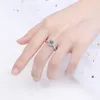 優秀なカットダイヤモンド良い透明性Moissaniteの結婚式のローズリングシルバー925ジュエリーの女性