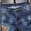 Na moda marca moda homens bordados slim jeans estiramento coreano casual calças de perna masculina empresários homens pouco calças 210531