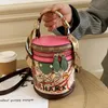 Whole factory ladies shoulder bags sweet cute bear graffiti bucket bag street trend cylinder women ribbon handbag European pop3103