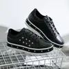 Vår och höst PU Kvinnors Casual Skor Star Decal Black Flat Shoes Walking Sports Style Lace Up Sandshoe