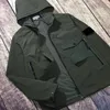 Spring and summer men's casual jacket fashion solid color Hooded coat Outdoor functional assault Suit With badge European American brand