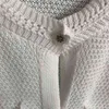 Automne coréen vintage tricoté cardigans pulls femmes simple boutonnage à manches courtes poches à col rond dames élégantes 210513