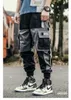 Męskie spodnie Trendy multi kieszeni Mężczyznowe spodnie Śledź joggers streetwear hip hop swobodny męski sportowy spodni