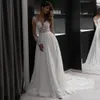 Boho gasa una línea vestidos de novia Sexy ilusión playa vestidos de novia Apliques de encaje mangas largas robe de mari￩e joya cuello botones traseros vestido de novia bohemio 2021