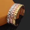 Europe America Fashion Style Men Lady Women Titanium steel 18K Gold Engraved Letter Flower Open Carved Bangle Bracelet M003322800161