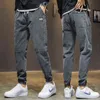 Qiu dong saison nouvelles tenues pantalons décontractés hommes marée décontracté joker faisceau ins han édition haroun pantalon pieds masculins pantalon H1223