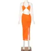 Conjunto de dos piezas de ropa de calle naranja neón a la moda, chándal para mujer, camisola con cuello Halter + faldas con cordón Midi, conjunto a juego, trajes femeninos 210625