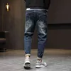 Mens Jeans Harem Pants Fashion Pockets Desinger Löst fit baggy Moto Jeans Män sträcker retro Streetwear Relaxed avsmalnande jeans 42 210330