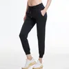 Kobiety Tkaniny Stretch Luźne Fit Sport Aktywny Skinny Legginsy z dwoma bocznymi kieszeniem Camo Długość Długość spodnie 211112