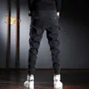 Fashion Streetwear Men Jeans Multi Psockets Multi Pantaleros de carga casuales Hombre de alta calidad Coreano Hip Hop Joggers pantalones de piernas anchas