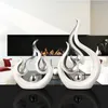 Moderno creativo bianco a forma di fuoco accessori in ceramica casa soggiorno scrivania arredamento decorazione tavolino figurine artigianato 210811