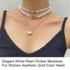 Élégant collier ras du cou en perles blanches pour femmes esthétique couleur or pendentif coeur colliers bijoux accessoires Collier Femme