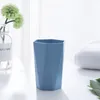 Geometrische Form Waschbürste Tasse Reise Toilettenartikel Zahnbürste Kunststoff Anti-Rutsch-Badezimmer-Accessoires für Paare