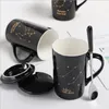 Con confezione regalo 12 s Tazze creative in ceramica con coperchio a cucchiaio Tazza da caffè al latte in porcellana nera e oro Zodiac 400ML Acqua 220311