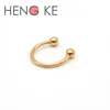 Hengke Rose Gold Horseshoe Pierścień Labret Lip Pierścienie z piłką Circular Barmell Nos Hoops przegrody Piercing 316L Stal nierdzewna