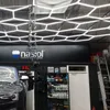 Luci esagonali personalizzate con luce di lavoro per lampada da officina con dettagli in studio per auto