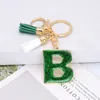 Mode vente femmes lettre porte-clés 26 paillettes évidé Alphabet anglais porte-clés sac à main artisanat bijoux breloques cadeau