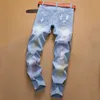 Весна мужские разорванные байкер джинсы мода тонкий отверстие паста краска модные брюки мужчина ковбои случайные прямые проблемные брюки